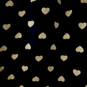 Navy, sleeveless blouse with heart print